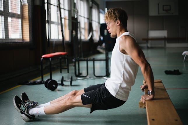 A Hiking Fitness Plan - Man doing bicep dips
