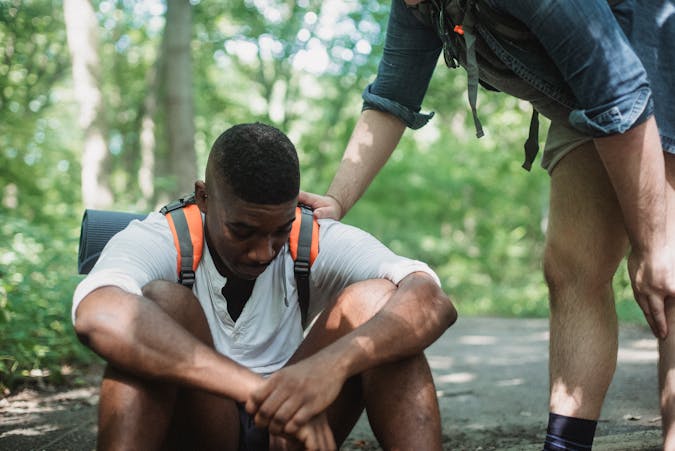 Treating Hiking Injuries - Man resting