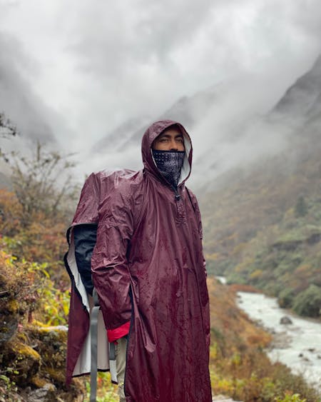 Hiking In The Rain Guide - Hiker in a ponch