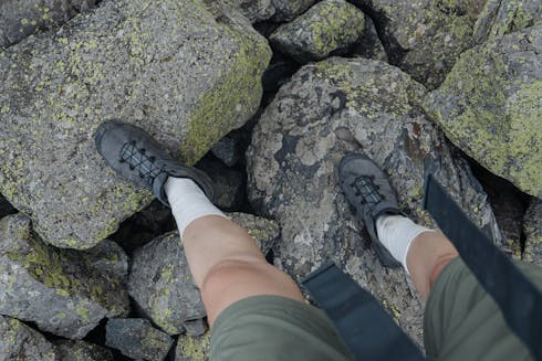 How To Hike On Rocky Terrain Safely - feet on rocks