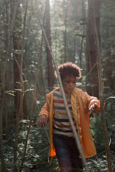 Safety Tips For Hiking With Children - Boy in a bright orange jacket